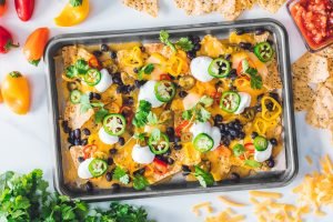 LOADED BLACK BEAN NACHOS WITH QUESO